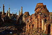 Inle Lake Myanmar. Indein, on the summit of a hill the  Shwe Inn Thein Paya a cluster of hundreds of ancient stupas. Many of them are ruined and overgrown with bushes. 